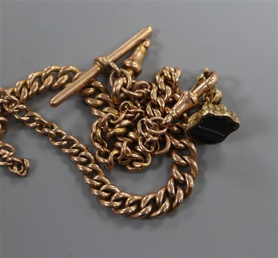 A 9ct. gold curb link watch chain, in two parts, with a yellow metal and agate fob seal, gross 44 grams.